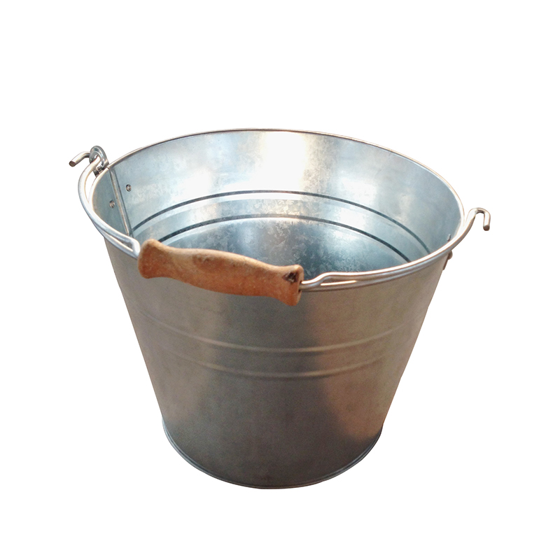 Galvanized metal bucket of water with wood handle