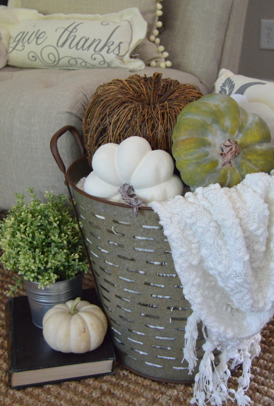 Olive buckets make for pretty storage around the house and are perfect pieces to throw a pumpkin inside and call it fall decor