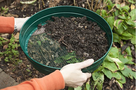 USING GARDEN SIEVE SOIL SIFTER TO SIEVE SOIL